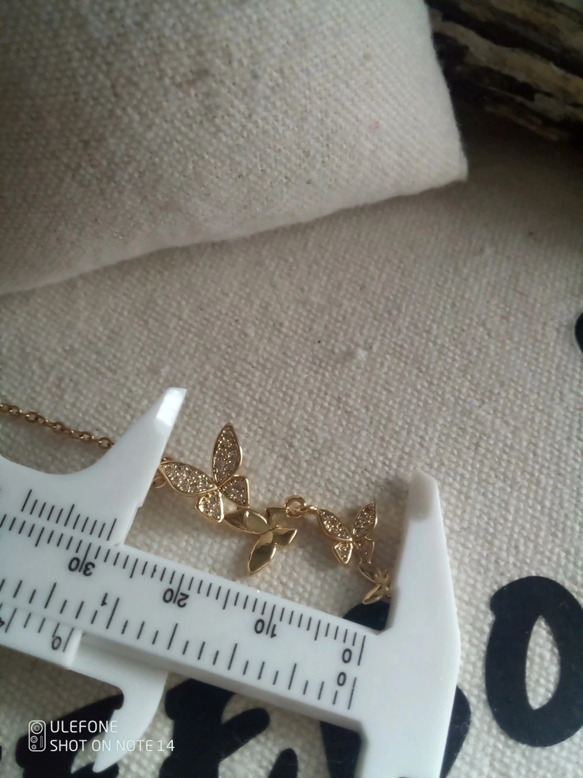 Collier cascade de papillons dorés – photo 2